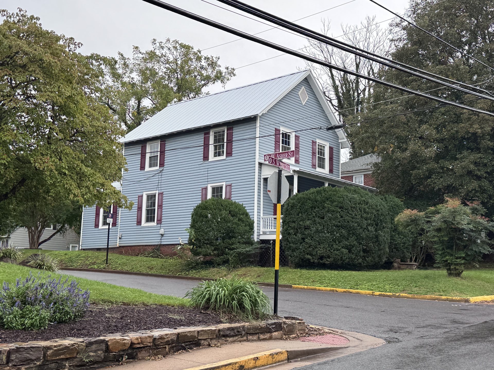 Completed standing-seam metal roof project by Mike's Roofing in Virginia